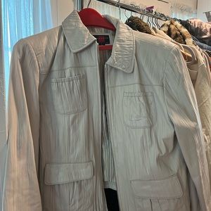 Women’s leather jacket cream colored.
